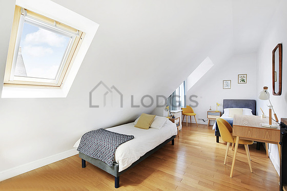 Bedroom with wooden floor