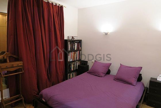 Bedroom with wooden floor