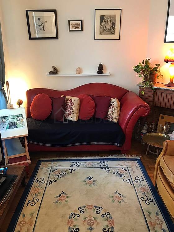 Quiet living room furnished with tv, 1 armchair(s), 1 chair(s)