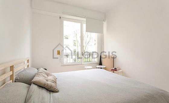 Very quiet living room furnished with 1 bed(s) of 140cm, cupboard