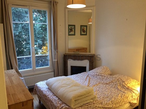 Bedroom with wooden floor