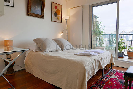 Bedroom with wooden floor