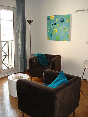 Very quiet living room furnished with 1 bed(s) of 140cm, tv, 1 armchair(s), 1 chair(s)