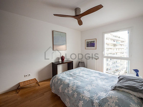 Chambre de 12m² avec du parquet au sol