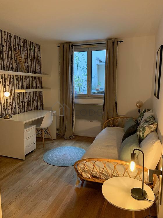 Bedroom with wooden floor