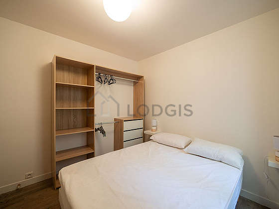 Bedroom equipped with wardrobe, bedside table