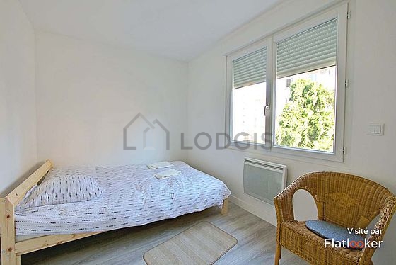 Chambre de 13m² avec du parquet au sol