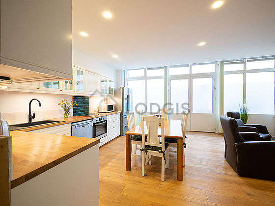 Kitchen where you can have dinner for 6 person(s) equipped with washing machine, refrigerator, crockery