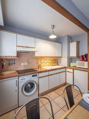 Kitchen where you can have dinner for 4 person(s) equipped with washing machine, refrigerator, freezer, extractor hood