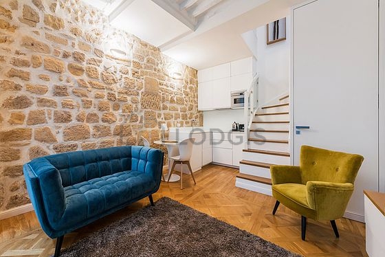 Living room with windows facing the courtyard