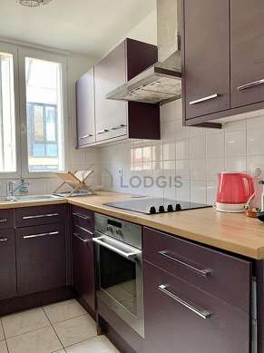 Very bright kitchen with double-glazed windows facing the road