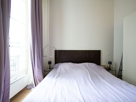 Bedroom with wooden floor