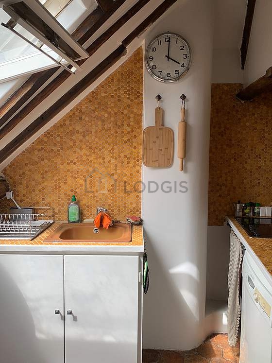 Magnifique cuisine de 8m² avec des tomettes au sol