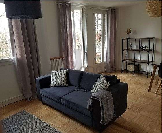 Very quiet living room furnished with tv, 1 armchair(s), 4 chair(s)