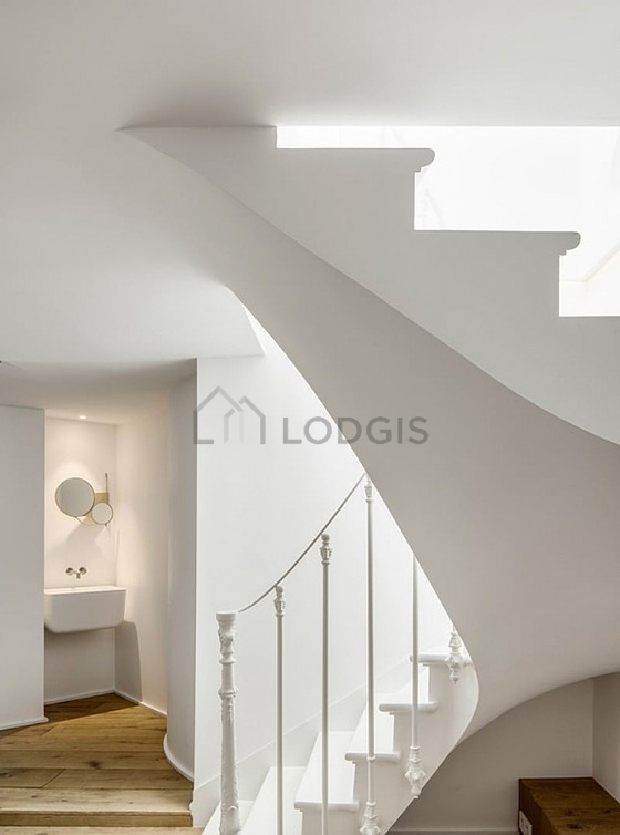 Pleasant and very bright bathroom with wooden floor