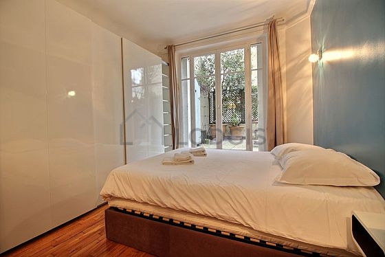 Bedroom with windows facing the courtyard