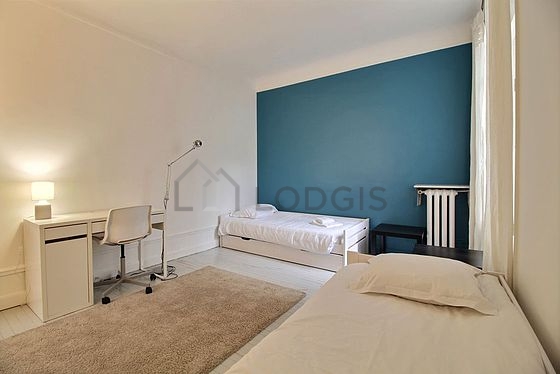Bedroom with wooden floor