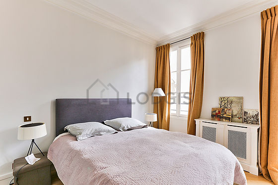 Bedroom with wooden floor