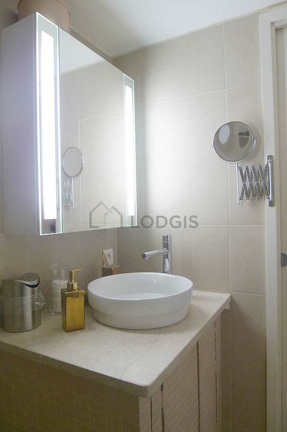 Pleasant and bright bathroom with tile floor