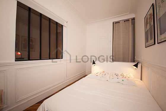 Bedroom with wooden floor