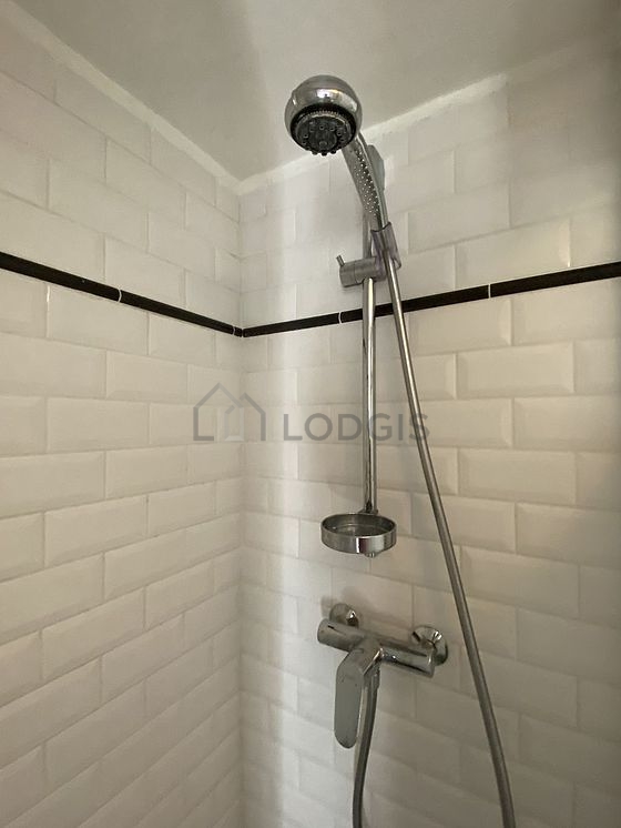 Pleasant and bright bathroom with tile floor