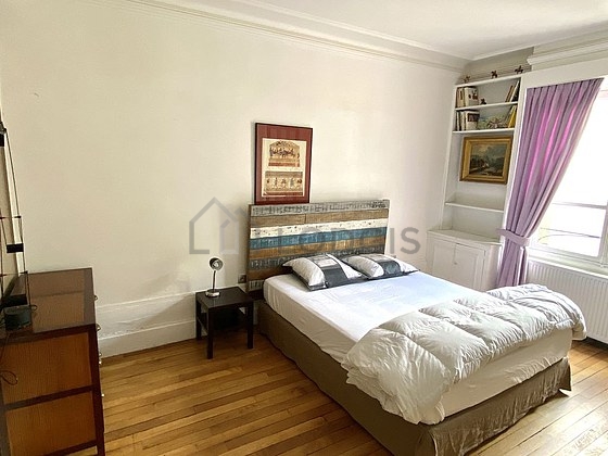 Bedroom with wooden floor