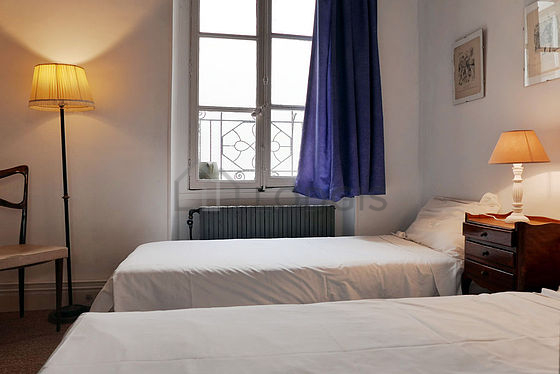 Bedroom with wooden floor