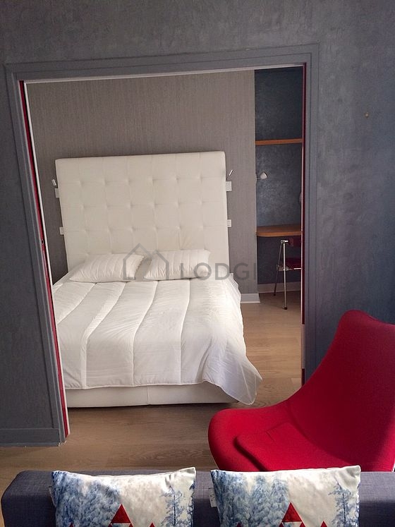 Bedroom with wooden floor