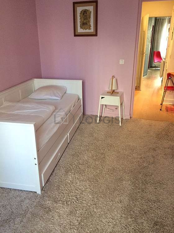 Bedroom with the carpeting floor