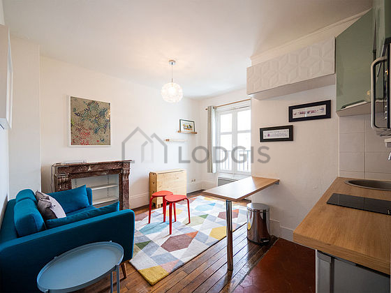 Quiet living room furnished with sofa, 2 chair(s)