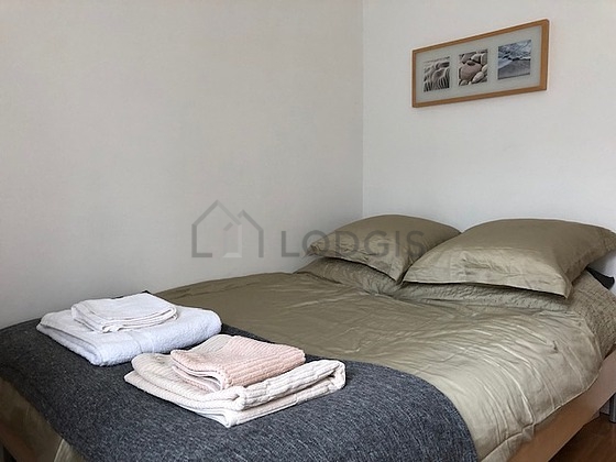 Bedroom with wooden floor
