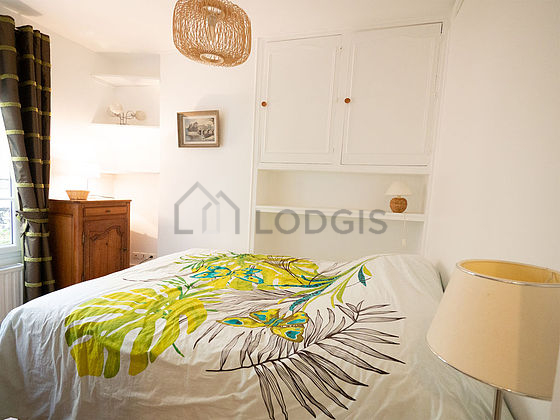 Bedroom with wooden floor