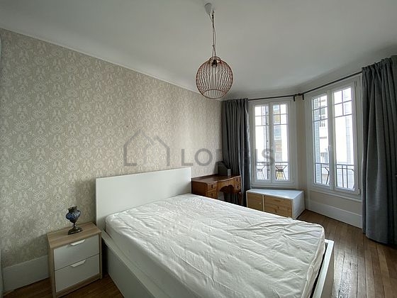 Chambre de 13m² avec du parquet au sol