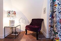 Nice alcove with floor tiles floor close to the living room