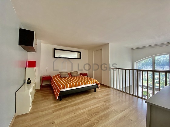 Bedroom with wooden floor