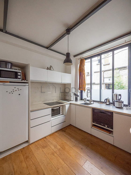 Kitchen where you can have dinner for 2 person(s) equipped with dishwasher, hob, refrigerator, crockery