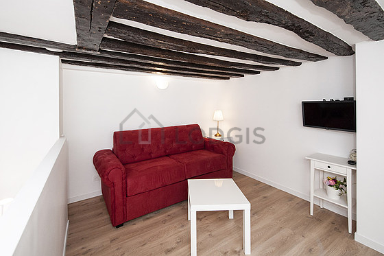 Chambre de 9m² avec du parquet au sol