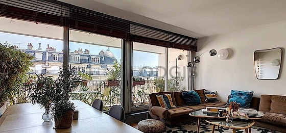 Very quiet living room furnished with tv, dvd player, 1 armchair(s), 1 chair(s)