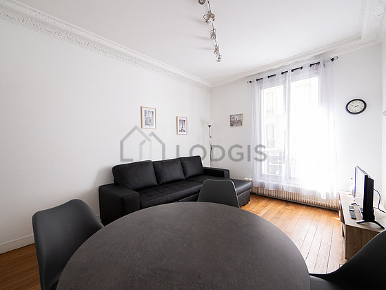 Living room furnished with tv, 4 chair(s)