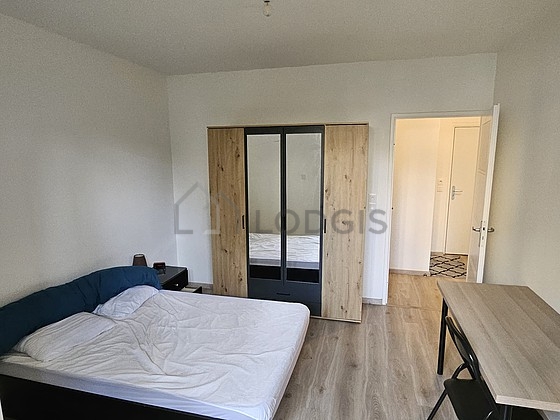Bedroom with wooden floor