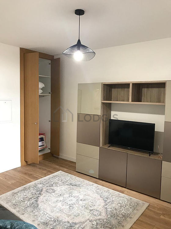 Very quiet living room furnished with 1 sofabed(s) of 120cm, tv, wardrobe, 1 chair(s)
