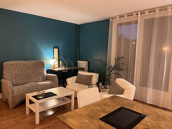 Living room furnished with sofa, 1 chair(s)