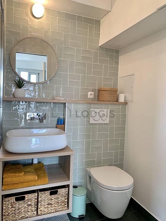 Pleasant and bright bathroom with tile floor