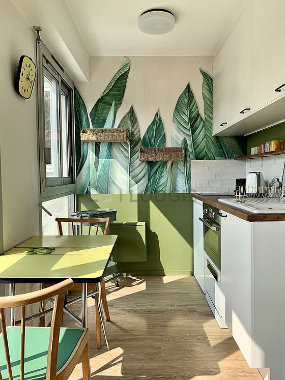 Kitchen where you can have dinner for 2 person(s) equipped with dishwasher, hob, refrigerator, crockery