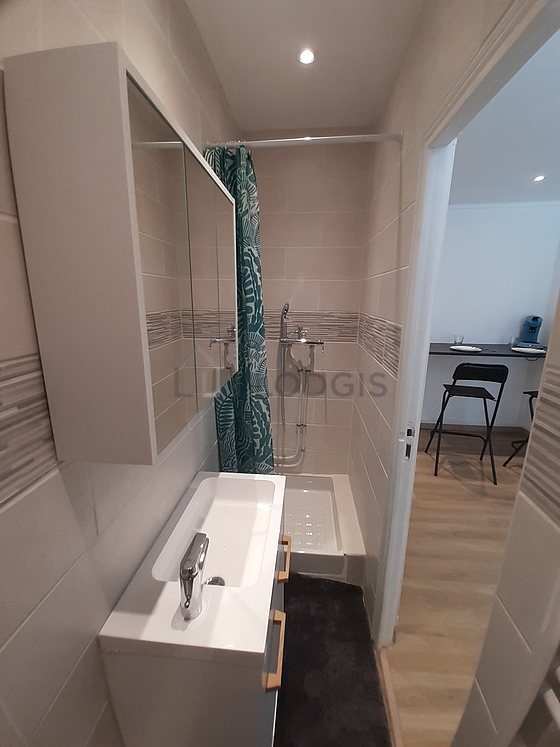 Bathroom equipped with cupboard