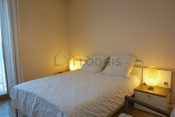 Chambre de 13m² avec du parquet au sol