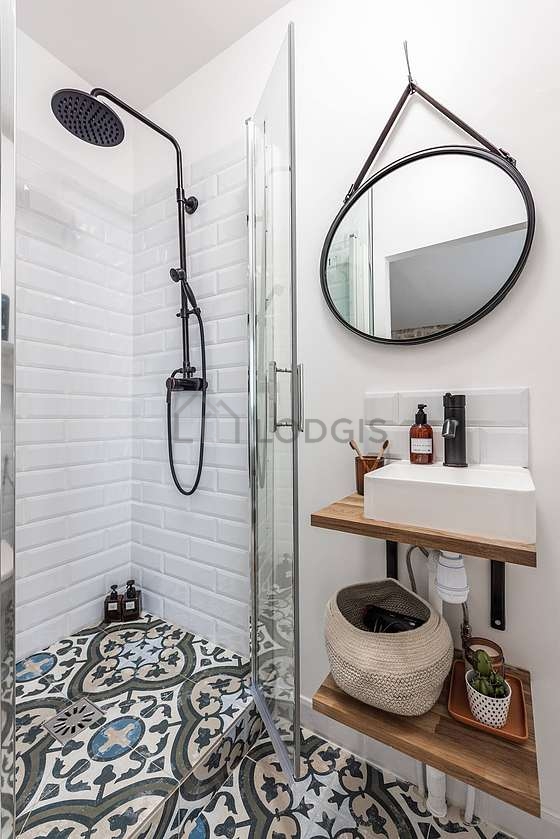 Pleasant and bright bathroom with tile floor
