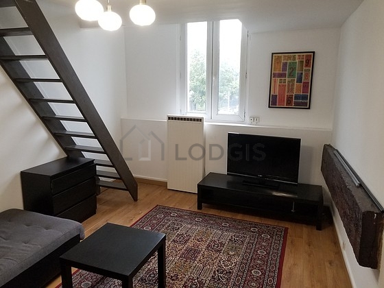 Very quiet living room furnished with 1 sofabed(s) of 140cm, tv, wardrobe, cupboard
