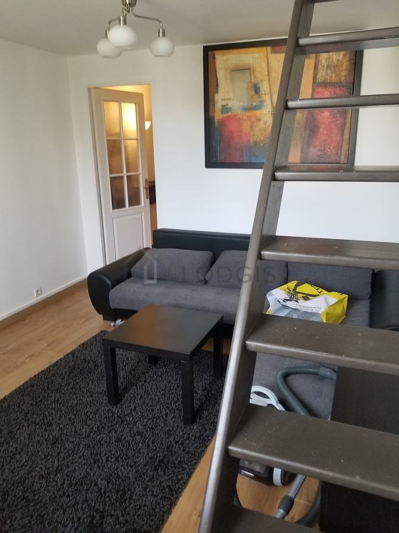 Living room with double-glazed windows facing the road