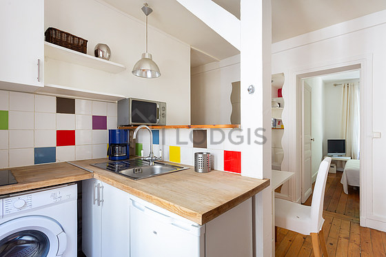 Kitchen where you can have dinner for 2 person(s) equipped with washing machine, refrigerator, freezer, crockery